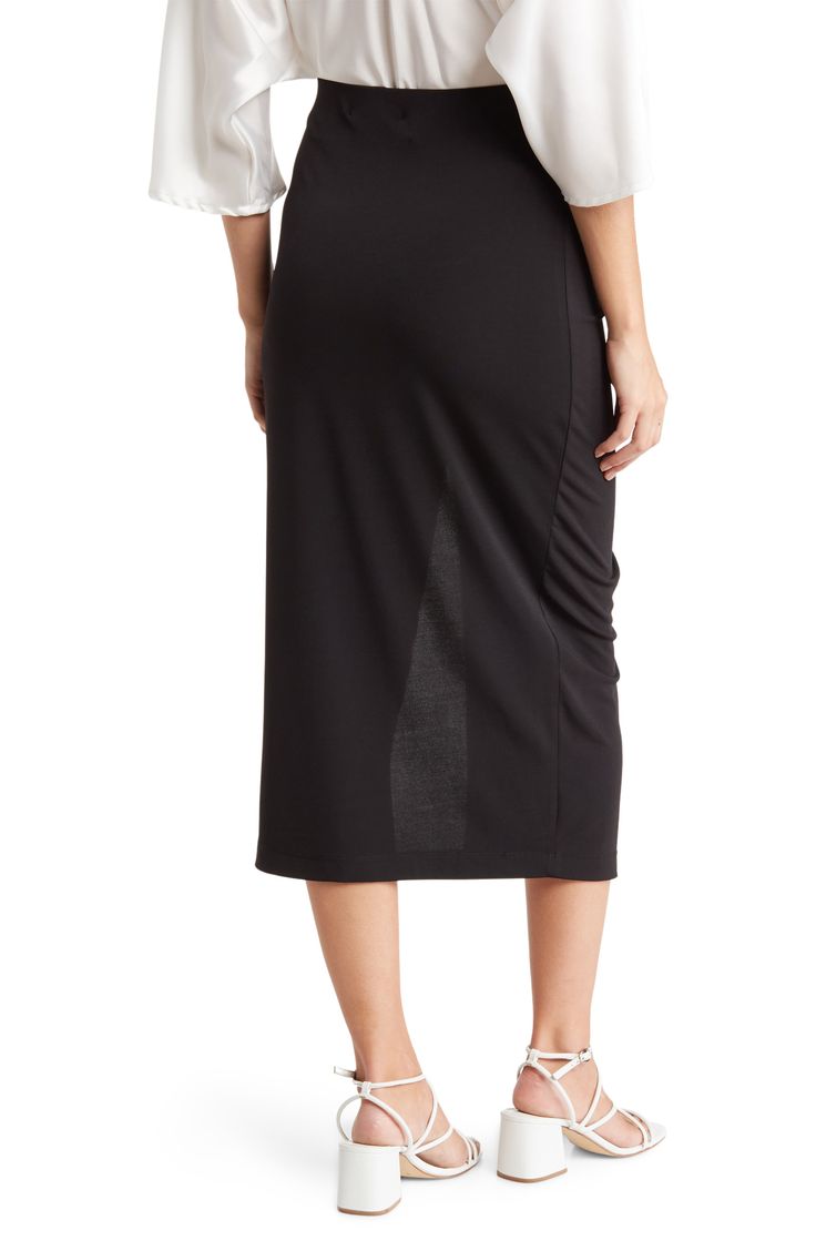 Side ruching adds definition to this midi-length skirt made from stretchy fabric. 30" length (size S) 95% polyester, 5% spandex Machine wash, line dry Made in the USA of imported fabric Model stats: 5'10" height, 32" bust, 25" waist, 36" hip. Model is wearing size S. Spring Fitted Midi Draped Skirt, Spring Fitted Midi-length Draped Skirt, Fitted Midi-length Draped Skirt For Spring, Elegant Ruched Bottoms In Midi Length, Fitted Midi Draped Skirt With Lining, Fitted Lined Draped Midi Skirt, Elegant Ruched Midi Bottoms, Elegant Ruched Midi Length Bottoms, Fitted Midi Length Draped Skirt