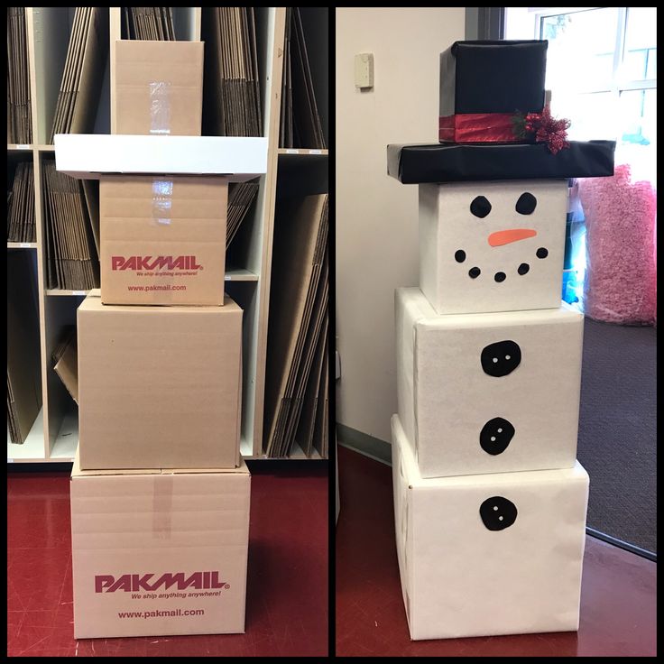 two boxes stacked on top of each other with a snowman made out of them