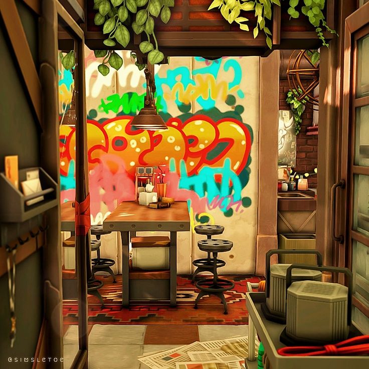 a room with graffiti on the walls and a table in front of an open door