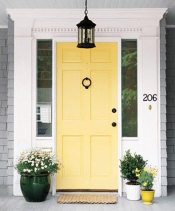 a yellow front door with the words home upgrades that pay off on it and an image of