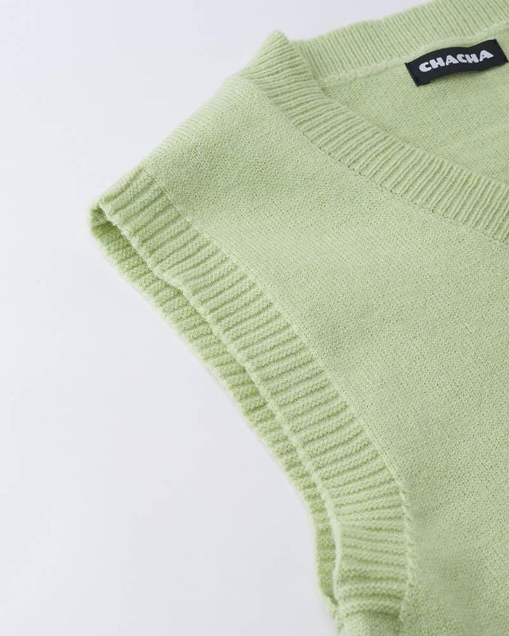 Details: Essential green knitted vest with V-neck design Top Length: Normal Sleeve Length: Sleeves Materials:95% Polyester + 5% Spandex Green V-neck Sweater Vest For Summer, Green Knit V-neck Sweater, Green V-neck Vest For Winter, Green Cotton V-neck Tank Top, Green Knit Vest For Fall, Green Casual Vest For Fall, Casual Green Vest For Fall, Casual Green Sleeveless Vest, Green Crew Neck Vest For Summer