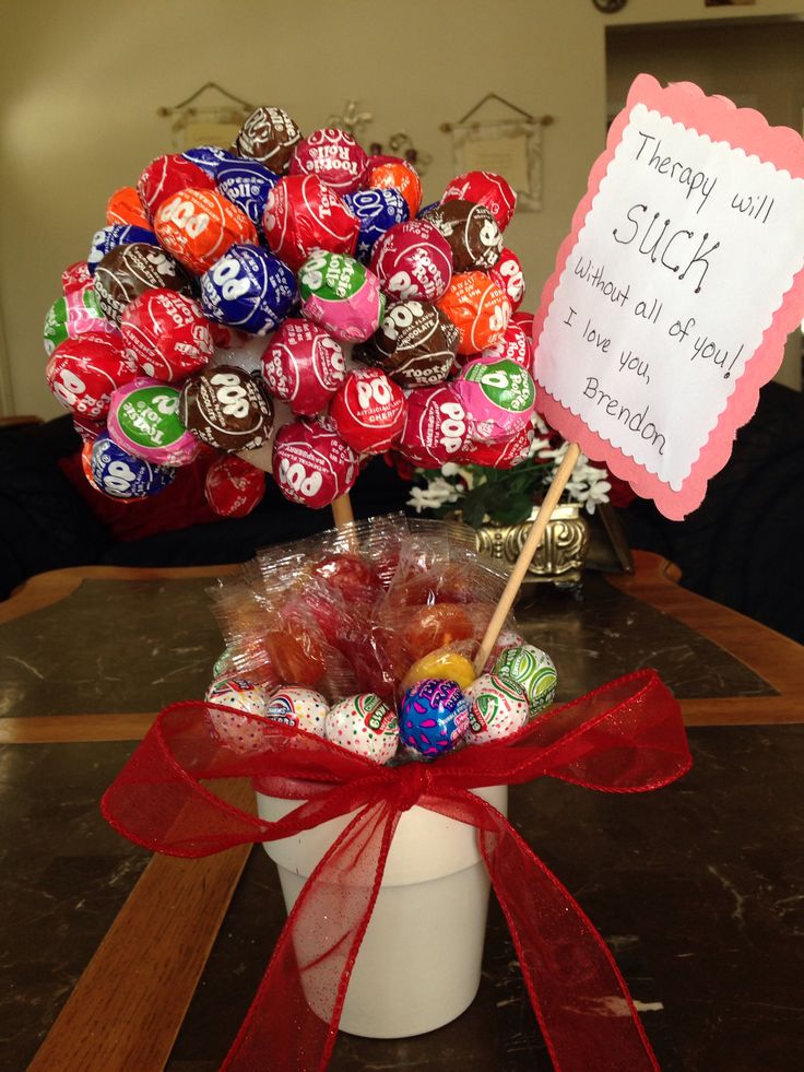 a vase filled with lots of chocolate candies