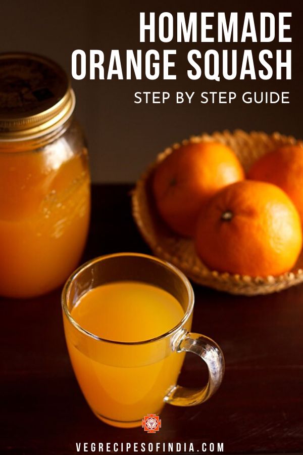 orange juice in a glass mug next to some oranges on a wooden table with the words, fruit juice recipes