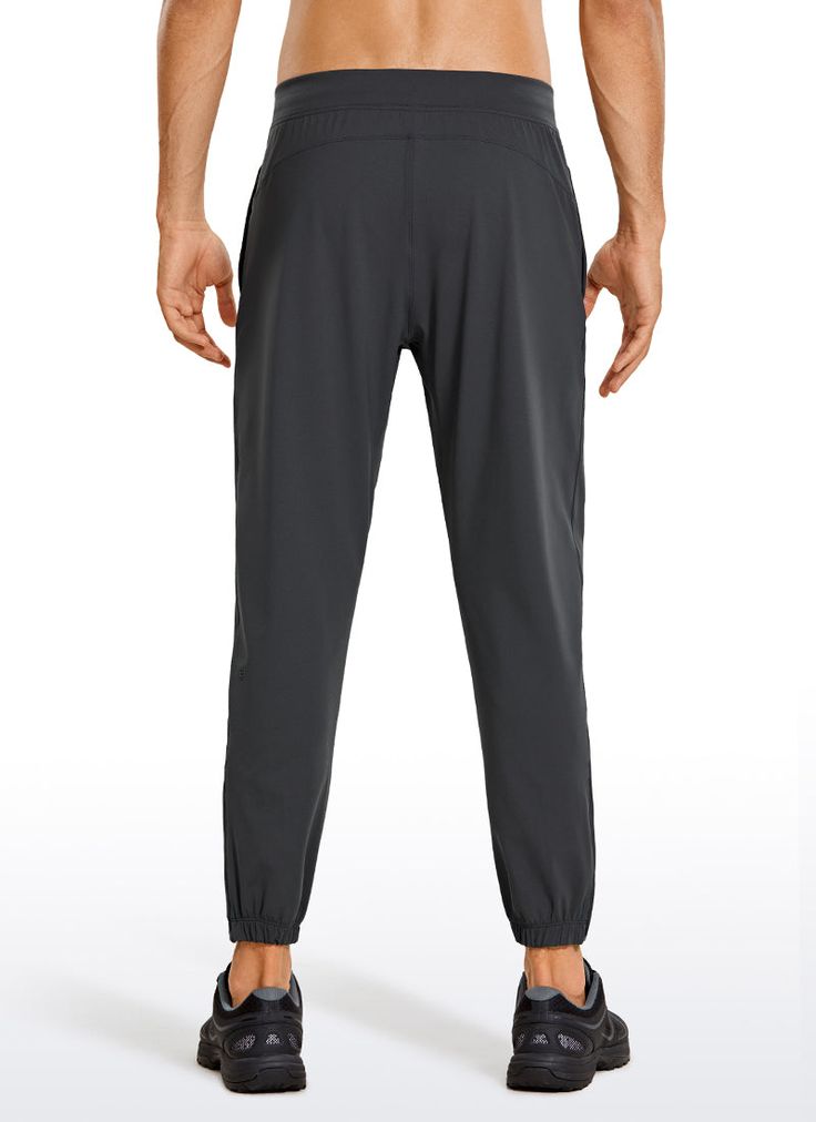 The lightweight Joggers are a bottom layer you cant go wrong with. Made of breathable and soft fabric, which is lightweight, stretchy, and smooth on your skin, quickly wicks away sweat during workout. Feature & Fitting: 
 Design for workout 
 Drawsring closure, 28 inches 
 Invisible zipper pockets 
 Ankle zippers 
 True to size 
 Fabric: 
 Naturally breathable 
 Stretchy and sweat-wicking 
 Soft and smooth 
 
 Lightweight 
 69%Polyamide, 31%Spandex Athletic Fit Activewear With Light Support For Jogging, Light Support Athletic Fit Activewear For Jogging, Gray Activewear Long Pants With Comfort Waistband, Workout Pants With 4-way Stretch And Tapered Leg, Workout Tapered Leg Pants With 4-way Stretch, Functional Gray Running Bottoms, Gray Gym Pants With Comfort Waistband, Gray Stretch Joggers With Elastic Waistband, Versatile Athletic Fit Bottoms For Training