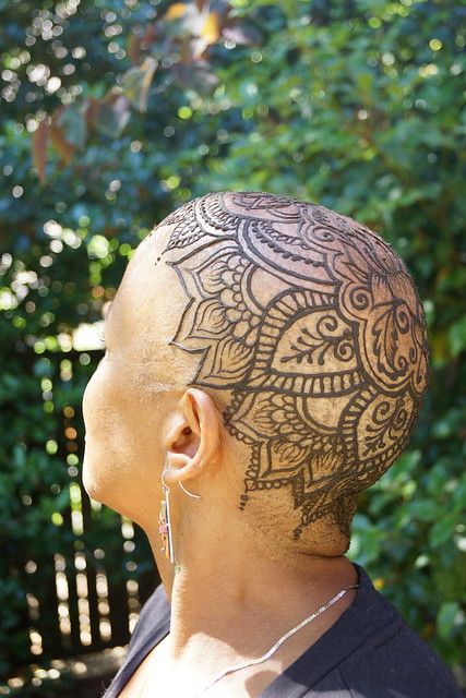 a person with a tattoo on their head