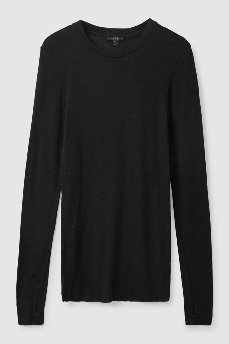 Crafted from traceable merino wool, this long-sleeve top is cut for a slim fit and features full length sleeves with a practical thumbhole cuff.  - Wide, round neck - Certified by the Responsible Wool Standard, to protect the welfare of the sheep and their environment  100% RWS Merino wool / Machine washable Back length of size S is 68cm Cashmere Crew Neck Top For Layering, Sleek Fine Knit Tops For Fall, Winter Layering Long Sleeve Top With Ribbed Neckline, Fitted Merino Wool Crew Neck Tops, Classic Merino Wool Tops With Ribbed Neckline, Classic Merino Wool Top With Ribbed Neckline, Black Fine Knit Long Sleeve Crew Neck Top, Wool Tops With Ribbed Neckline For Fall, Winter Long Sleeve Top With Thumbholes For Layering