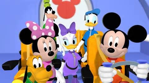 several cartoon characters are standing together in front of a blue and white wall with a mickey mouse on it