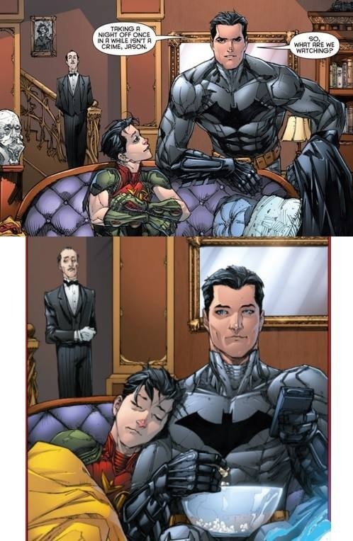 batman and his family are in bed together