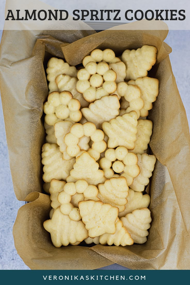 a bag full of almond spritz cookies with the title above it that says almond spritz cookies