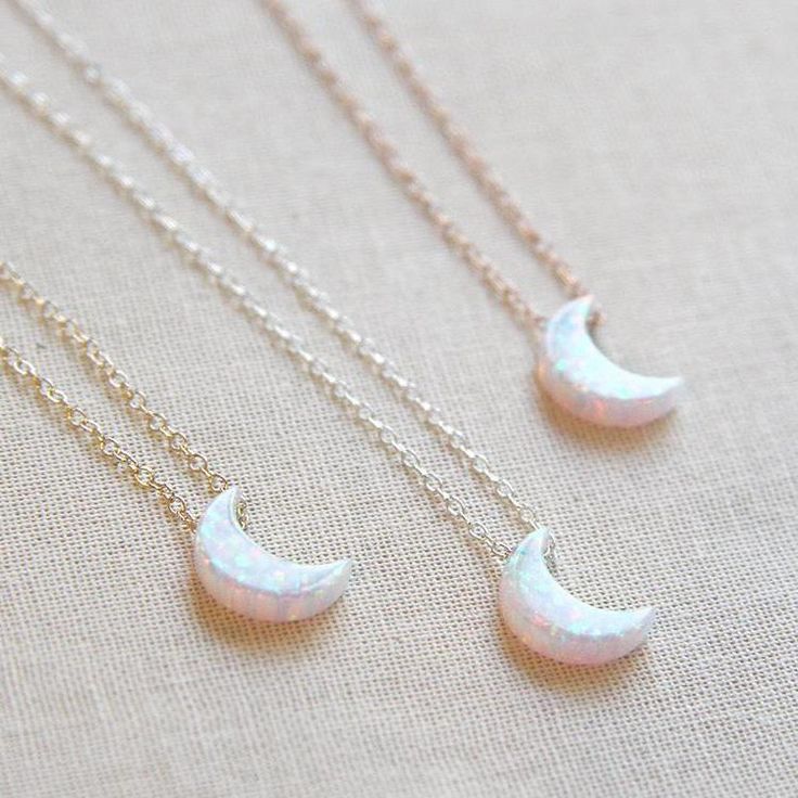 Opal crescent moon charm is a super-cute size and glides along the chain. Each one shines beautifully in the light! Details: Available in 14kt gold filled, 14kt rose gold filled + sterling silver White opal moon charm 16 inches long with 3 inch extender (can be worn 16-19 inches) White Sterling Silver Necklace With Moon Charm, Dainty Rose Gold Opal Jewelry, Dainty White Necklace With Moon Charm, Delicate Rose Gold Opal Jewelry, White Half Moon Necklace With Moon Charm, White Dainty Jewelry With Moon Charm, Dainty Rose Gold Jewelry With Moon Charm, Celestial White Opal Jewelry, Dainty 14k Gold Filled Moon-shaped Jewelry