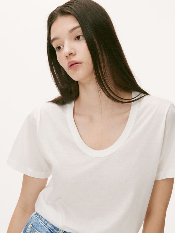 Editor's NotesThis is a basic U-neck T-shirt made of high quality silket material. This short-sleeved T-shirt is great to wear alone in the summer or layered with outerwear in spring, fall, and winter. The neckline is deep, so it can be matched with accessories such as necklaces.- The neckline is deep, so it can be matched with accessories such as necklaces.- Regular fit makes it easy for anyone to wear- Slight elasticity makes it comfortable to wearMeasurements(in.)ONE SIZE (XS-M)- Length: 25.2 in.- Shoulder: 15.75 in.- Chest: 18.5 in.- Hem: 18.5 in.- Sleeve length: 7.68 in.- Armhole: 8.27 in.*Size may vary depending on the person measuring it.*Model size: Height 5'68, Bust 31, Waist 23', Hip 34Composition & Care- 100% Cotton- Dry clean recommended- Please wash bright colors separatel Basic Summer T-shirt For Everyday, Classic V-neck T-shirt For Spring, Basic Short Sleeve T-shirt For Summer, Effortless Spring T-shirt For Layering, Effortless Summer T-shirt For Layering, Effortless Relaxed Fit T-shirt For Spring, Classic Solid Short Sleeve Top For Summer, Classic Short Sleeve Top With Relaxed Fit For Everyday, Classic Crew Neck Short Sleeve Top For Spring