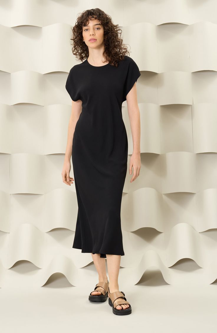 Channel relaxed style and understated sophistication in this streamlined maxi dress that's a versatile closet staple. 53" length (size 8) Back keyhole with button-and-loop closure Jewel neck Short sleeves Unlined 60% polyester, 40% recycled polyester Machine wash, tumble dry Imported Chic Solid Color Bias Cut Maxi Dress, Sleek Maxi Dress For Work, Black Maxi Dress With Side Slits For Work, Sleek Midi Dress With Side Slits For Work, Relaxed Fit Midi Dress With Side Slits, Midi Maxi Dress With Side Slits For Daywear, Chic Solid Maxi Dress With Flattering Silhouette, Chic Maxi Dress With Minimal Stretch, Bias Cut Maxi Dress For Daywear