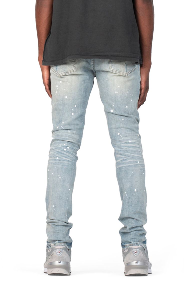 Threadbare holes, spatters of paint and dirty, grungy fading bring lots of signature appeal to these low-rise skinny jeans made with a hint of stretch. 32" inseam, 10" leg opening; 10" front rise; 15" back rise (size 29) 98% cotton, 2% Lycra® spandex Machine wash, line dry Imported Asian Owned/Founded Fitted Denim Jeans With Paint Splatter, Fitted Paint Splatter Denim Jeans, Spring Streetwear Jeans With Paint Splatter, Fitted Paint Splatter Jeans, Casual Fitted Jeans With Paint Splatter, Urban Style Paint Splatter Jeans For Streetwear, Fitted Cotton Bottoms With Paint Splatter, Spring Fitted Jeans With Paint Splatter, Fire Clothes