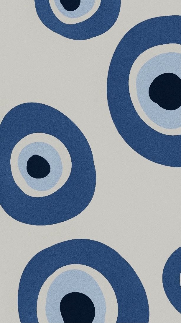 an abstract blue and white background with circles in the shape of eyeballs on it