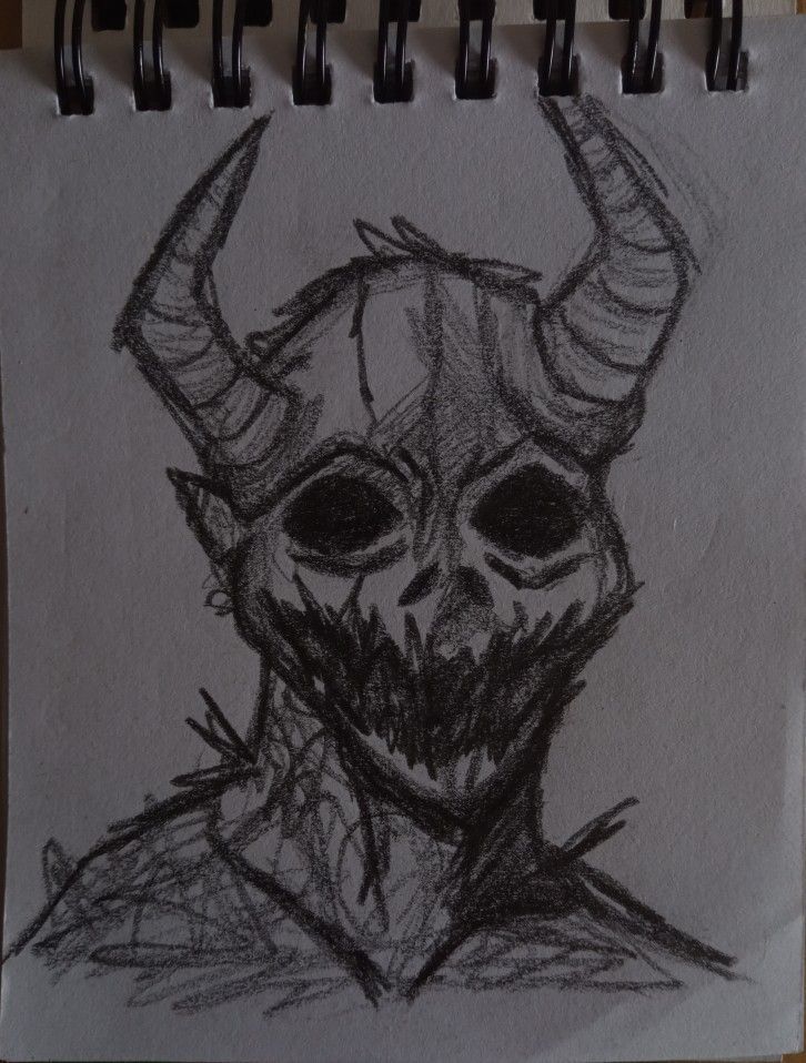 a drawing of a demon with horns on it's head