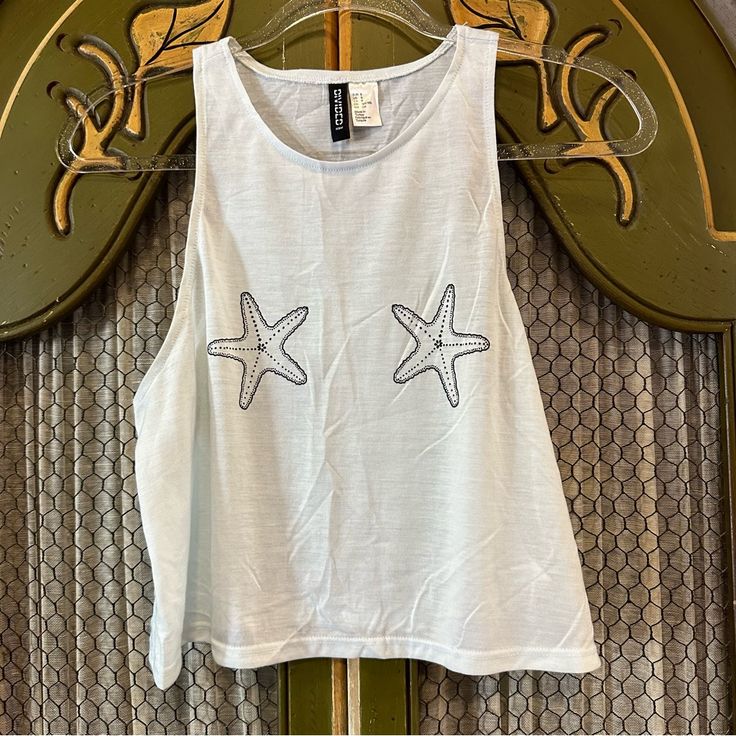 Women’s H&M Light Blue Star Fish Beach Crop Top Size Small Light Blue Star Fish Cropped Tank Super Cute Design Perfect For Beach / Summer Activities Never Worn! No Tags Size Small Trendy Star Print Summer Tops, Trendy Star Print Tops For Summer, H&m Summer Beach Tops, Cotton Summer Top With Star Print, Blue Star Print Summer Tops, Blue Star Print Tops For Summer, White Star Print Top For Summer, H&m Summer Tops For Day Out, H&m White Beach Top