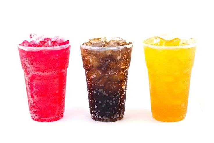 three different types of drinks in plastic cups