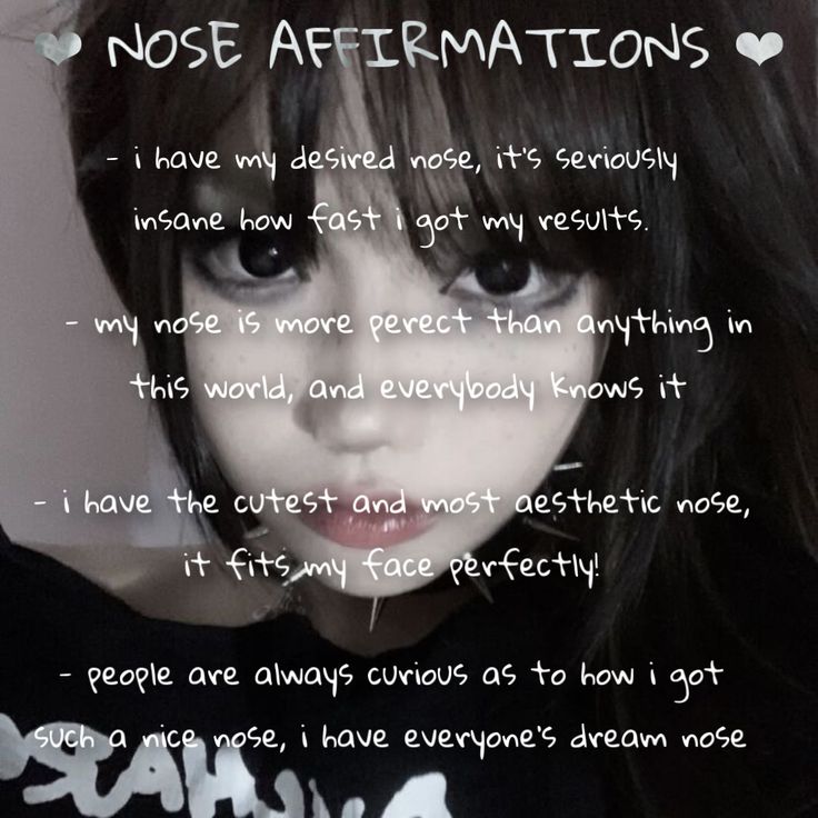 a girl with black hair and white lettering on her t - shirt that says, nose affirmations