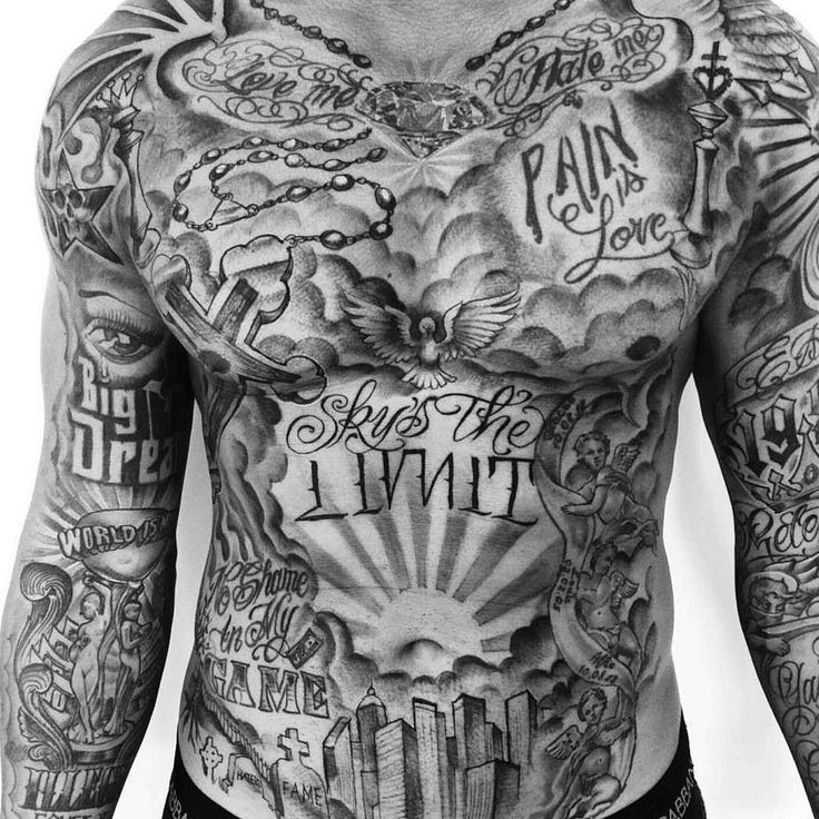 a man with many tattoos on his chest