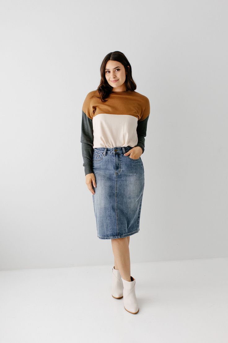 The 'Kyra' is another one of our very own exclusive denim skirts. Designed with everyday wear in mind, this skirt will pair well with just about any casual top in your wardrobe! This denim skirt is 100% cotton and does not have stretch, giving it a vintage vibe we love! Every woman needs a classic, straight denim skirt in her closet and this skirt is an excellent choice! Available in light or vintage wash. 100% Cotton Machine Wash Cold Gentle Cycle Do Not Bleach Hang to Dry Do Not Dry Clean Mode Fall Denim Skirt With Lined Detail, Relaxed Denim Skirt For Fall, Relaxed Fit Denim Skirt For Fall, Fall Dark Wash Relaxed Fit Denim Skirt, Dark Wash Denim Skirt For Fall, Relaxed Casual Denim Skirt For Fall, Denim Relaxed Fit Skirt For Fall, Dark Wash Relaxed Fit Denim Skirt For Fall, Relaxed Fit Dark Wash Denim Skirt For Fall