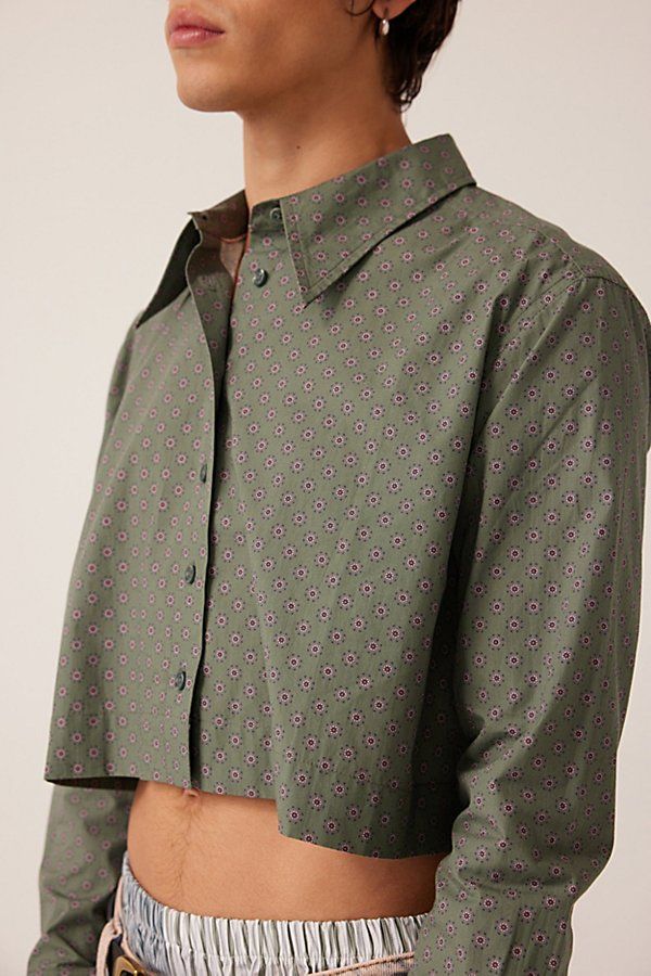 WILDFANG The Essential long sleeve cropped button-up shirt. Classic oxford button-up shirt made modern with a cropped length. Oversized fit in soft cotton with a stylized collar and wide buttoned cuffs. Complete with WILDFANG-branded buttons. Features WILDFANG The Essential long sleeve cropped button-up shirt Elevated essential oxford shirt in a modern cropped length Oversized fit with a straight hem Button closure Content + Care 100% Cotton Machine wash Imported Size + Fit Measurement taken from size Medium Length: 18" | WILDFANG The Essential Long Sleeve Cropped Button Up Shirt in Olive at Urban Outfitters Wicked Outfit, Cropped Button Up Shirt, Oxford Shirt, Button Up Shirt, Oversized Fits, Medium Length, Button Up Shirts, Urban Outfitters, Wicked