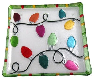 a decorative glass tray with lights on the side and wires running through it, all in different colors