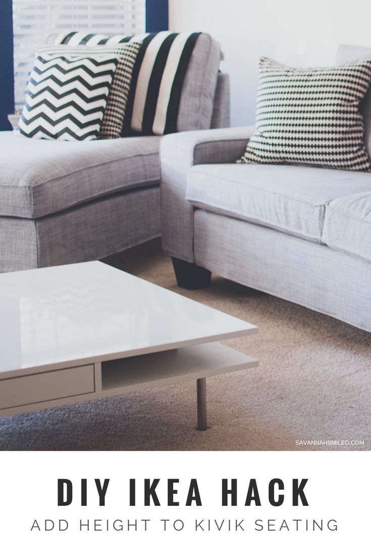 a living room with two couches and a coffee table in front of the couch