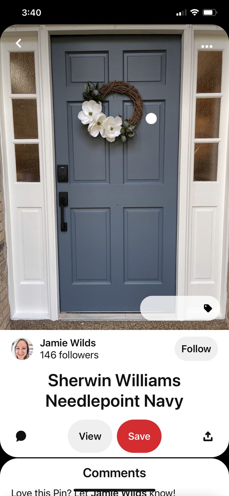 the front door is decorated with flowers and wreaths for someone to put on it