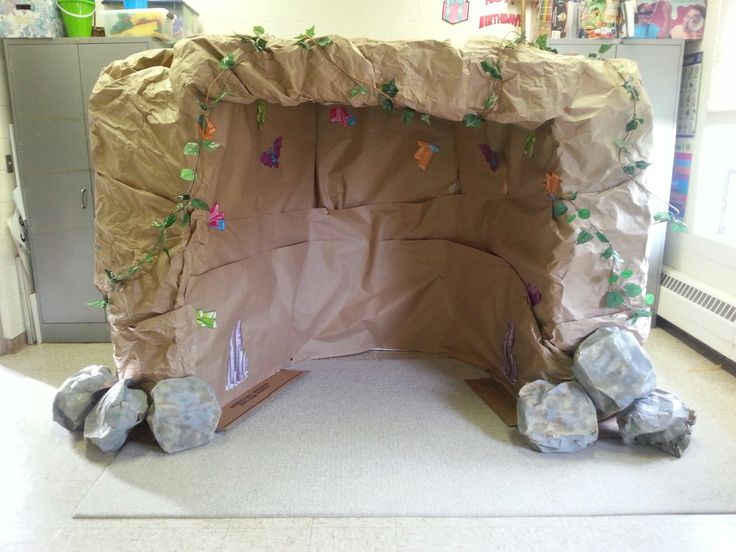 an indoor play area with rocks and paper mache