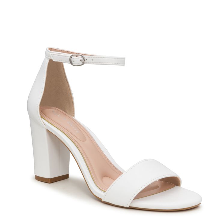 Flaunt your classic style sense with these women's Kelly & Katie Hailee white dress sandals. Crafted with synthetic upper, these ankle strap sandals come with round open toe design, adjustable ankle strap with buckle closure for a precise fit, faux leather lining and cushioned footbed for maximum comfort. Durable synthetic sole and trendy block heel complete this silhouette. This style is exclusive to Designer Brands Canada. | Kelly & Katie Women's Hailee Dress Sandal in White Size 10 Medium Prom Shoes White, Cute White Heels, Grad Fits, White Dress Sandals, Trendy Block Heels, Grade 9, Grade 8, Dress Inspo, White Heels