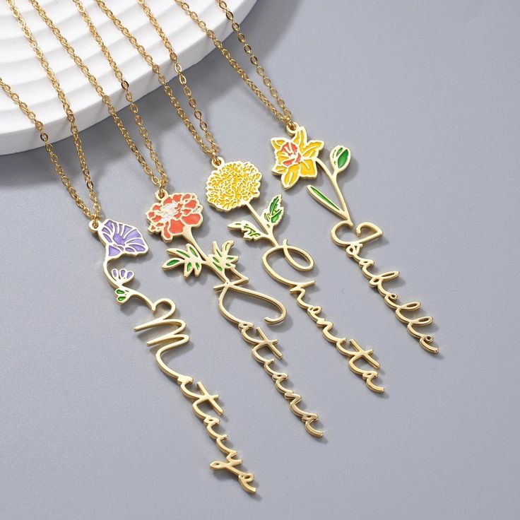 ❀Birth Flower Name Necklace❀ •Starting under $40 this week only! •Buy Now Pay Later with interest free installment payment options! Just select the provider of your choice at checkout! Embrace personalized elegance with our “Enamel Birth Flower Name Necklace”! Luxuriously PVD coated thrice in real 18k gold, this stunning piece beautifully showcases your name in intricate cursive script. Elevate its charm further with the inclusion of your birth month flower in vivid, colorful enamel atop the pen Luxury Birth Flower Necklace Gift, Luxury Birth Flower Necklace As Gift, Luxury Gold Necklaces With Birth Flower, Necklace For Bridesmaids, Engagement Details, Name Necklaces, Flower Names, Custom Charms, Month Flowers