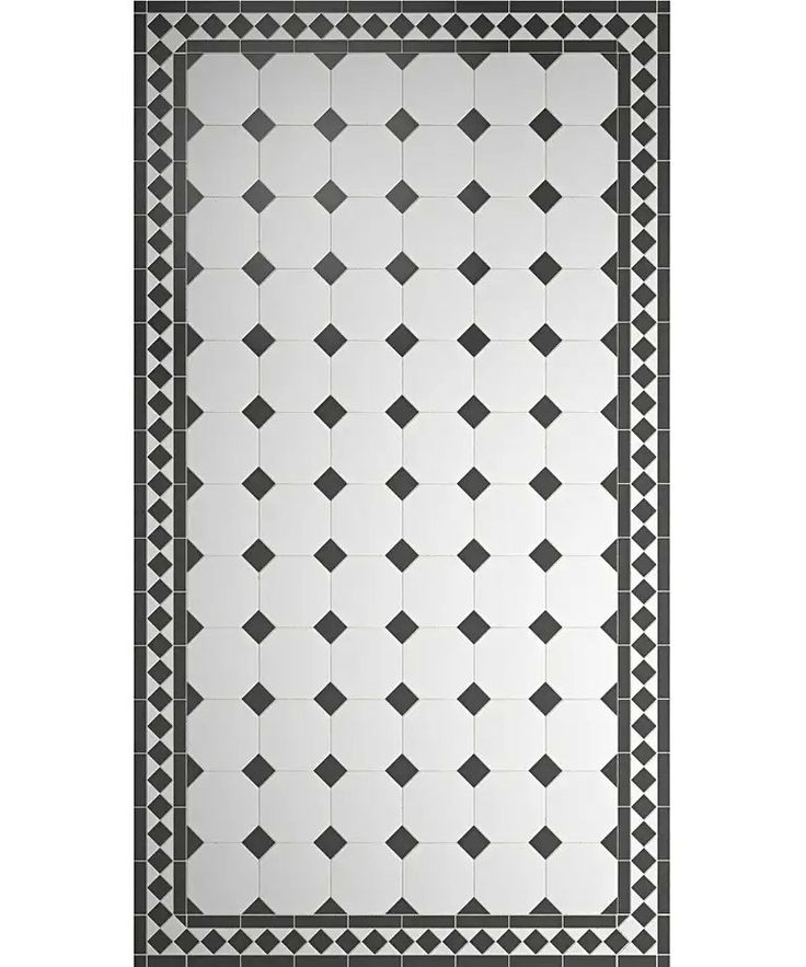 a black and white tile pattern on the wall