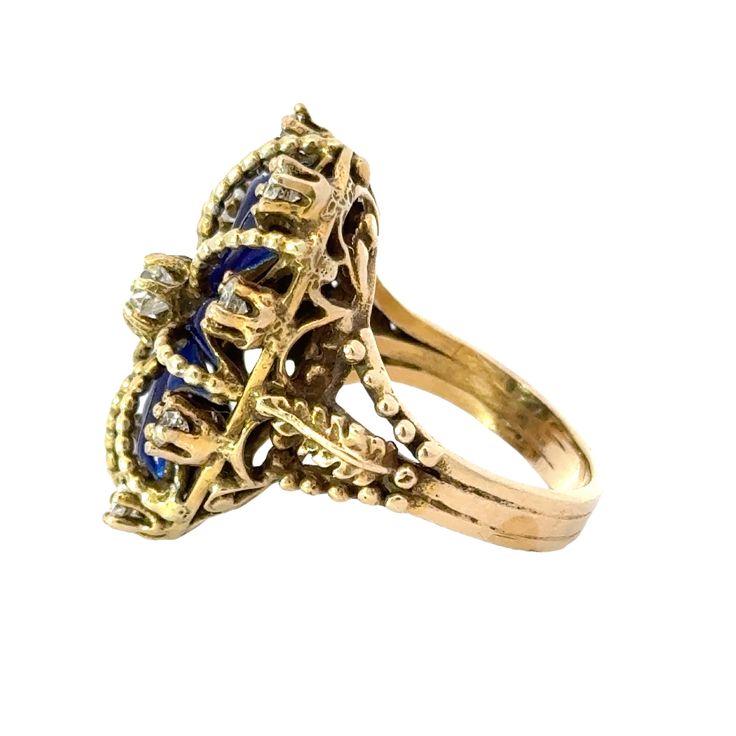 This antique ring in 14K yellow gold is regal in design, featuring a crown-like blue enamel and sparkling diamonds. Crafted with intricate details, this piece exudes a timeless elegance fit for royalty. Perfect for those seeking a vintage touch to their jewelry collection. Jewelry Style : RingMetal Type : 14K Gold Diamond : 9 Old Euro Cut , Approximately 1.0 ctwBlue EnamelApproximately 1.25" long x .80" wideRing Size : 7 : Can be sized by your local jewelerestate piece, sold as is, all weights a Blue 14k Gold Enamel Ring For Formal Events, Formal Blue Enamel Ring In 14k Gold, Blue 14k Gold Enamel Ring For Formal Occasions, Elegant Yellow Gold Enamel Ring With Diamond Accents, Vintage Blue Cluster Ring With Prong Setting, Heirloom Blue Ring With Diamond Accents, Heirloom Blue Rings With Diamond Accents, Vintage Diamond Enamel Round Ring, Vintage Gold Enamel Ring With Rose Cut Diamonds