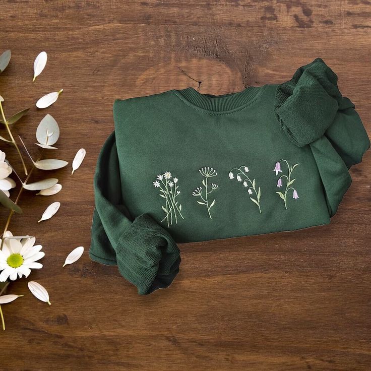 Floral Embroidered Sweatshirt | Cute Wildflowers Embroidered | Dark Green Daisy Sweatshirt Dark Green Hoodie, Daisy Sweatshirt, Green Daisy, Embroidery Hoodie, Sweatshirt Cute, Green Hoodie, Embroidered Sweatshirt, Embroidered Sweatshirts, The United States