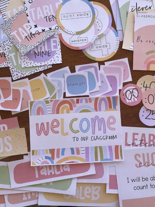 many different types of welcome cards and stickers on a table with the words welcome to our classroom