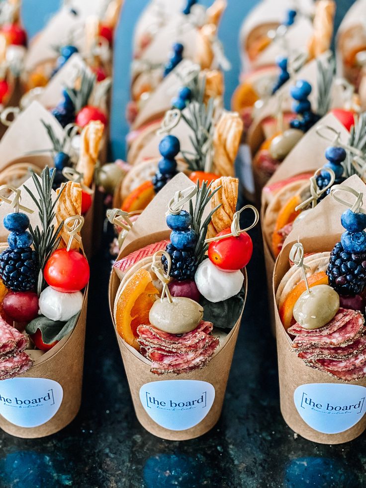 small cones filled with assorted fruits and vegetables