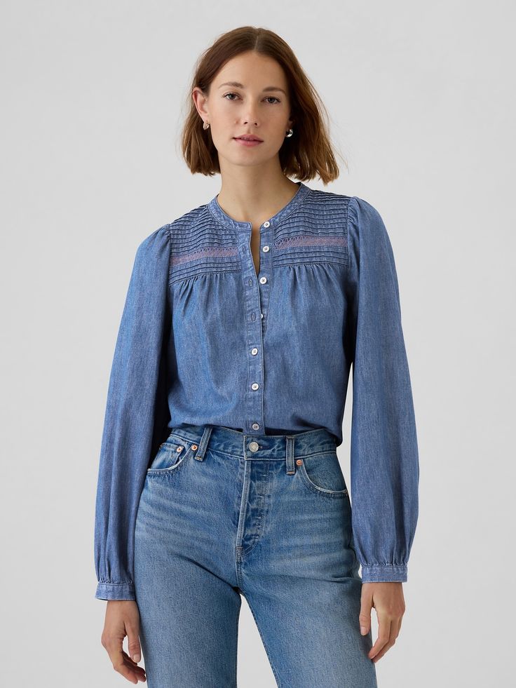 Soft cotton denim shirt.  Crewneck with lace detailing.  Long puff sleeves.  Button front.  Responsibly Made: This denim shirt is part of our water-saving Washwell program.  Compared with conventional wash methods, Washwell uses at least 20% less water and has saved over a billion liters of water since 2016.  * Fit: Relaxed.  A straight & easy fit.  * Style Note: For a more Classic fit, go down one Cheap Washed Long Sleeve Denim Top, Cheap Collared Denim Blouse, Cheap Washed Denim Top For Work, Cheap Denim Top With Buttons And Long Sleeves, Cheap Light Wash Denim Blouse, Cheap Medium Wash Denim Top With Snap Buttons, Cheap Everyday Denim Blouse, Cheap Cotton Denim Top For Fall, Cheap Denim Tops From Gap