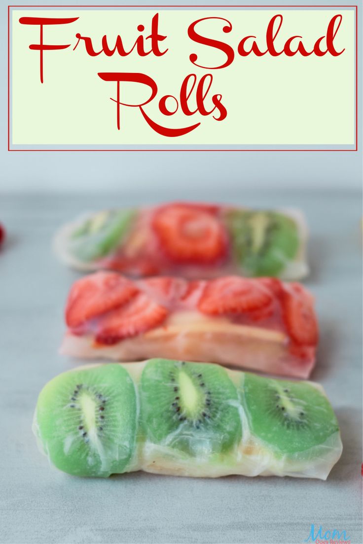 fruit salad rolls with kiwi and strawberries on top