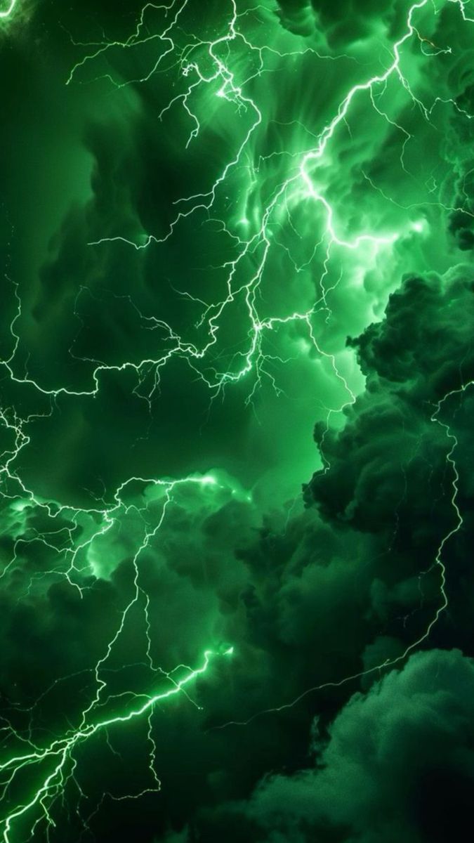 green lightning in the night sky with clouds