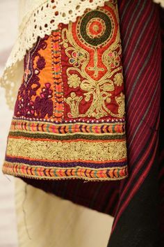 a woman's handbag is displayed on a mannequin