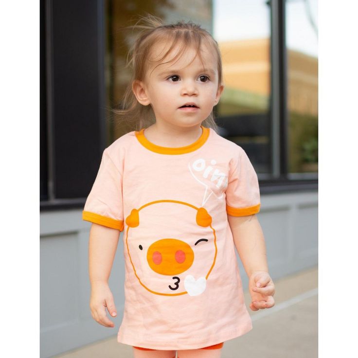 Doodle Pant's kid's and toddler shirts are casual and adorable tops designed for children. They are made from comfortable fabrics that allow kids to move freely and play with ease. With a variety of colors, patterns, and cute animal-themed artwork to choose from, our shirts shirts add a touch of style and individuality to any outfit. They are versatile and can be paired with jeans, shorts, or skirts, making them suitable for any occasion or every day wear! Playful Cartoon Print T-shirt For Playwear, Fun Pink T-shirt For Playtime, Cotton Short Sleeve T-shirt For Playdate, Family Matching Short Sleeve Tops For Playwear, Casual Cartoon Print Tops For Playtime, Casual Tops With Cartoon Print For Playtime, Fun Cotton Tops For Playtime, Casual T-shirt For Playdate, Fun Cotton T-shirt For Playdate