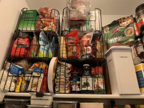 an organized pantry with food and drinks