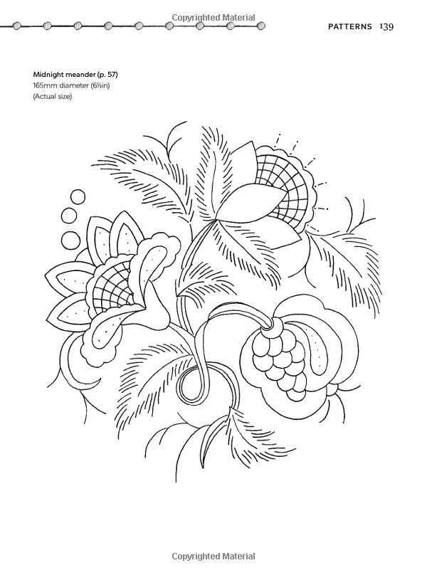 a drawing of flowers and leaves on paper with some lines in the middle, as well as