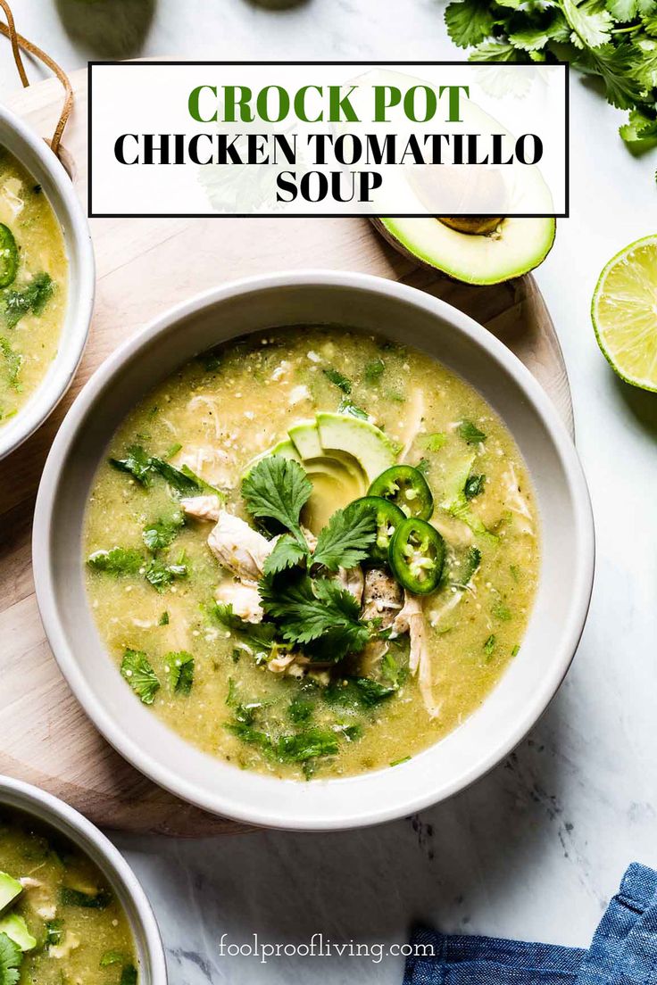 two bowls of chicken tortilla soup with avocado and cilantro