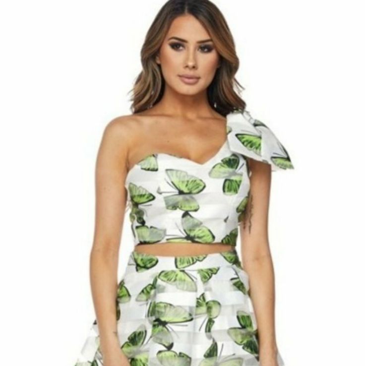 Butterfly Print One Shoulder Ribbon Top And Skirt Set. Fabric: 100% Polyester Measurement: S: Bust 34, Waist 26 M: Bust 36, Waist 28 L: Bust 38, Waist 30 Chic White Skirt For Garden Party, Chic Mini Skirt For Summer Cocktail, Fitted Mini Skirt For Summer Cocktail Events, Chic Mini Skirt For Summer Cocktail Events, Summer Cocktail Mini Skirt, Fitted, White Summer Cocktail Skirt, White Cocktail Skirt For Summer, Chic Green Floral Print Mini Skirt, Chic Fitted Skirt For Garden Party