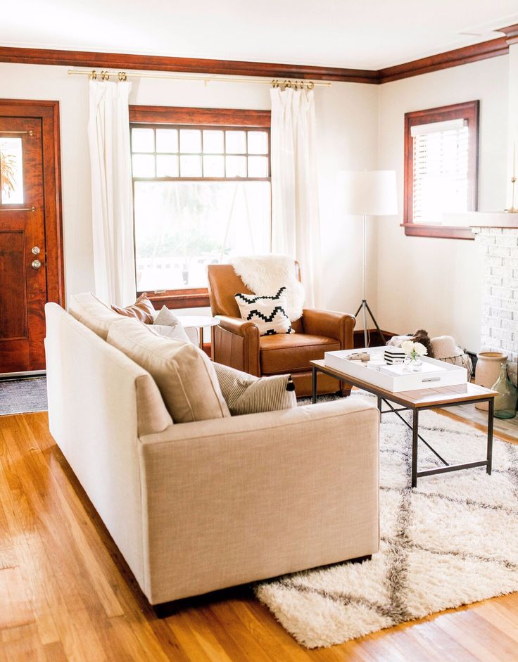 the living room is clean and ready to be used as a den or family room