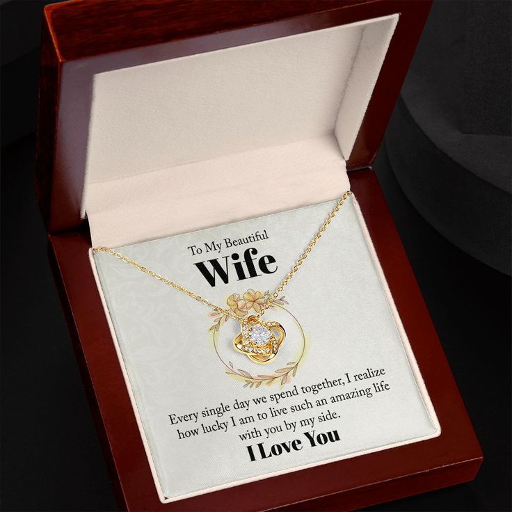 Imagine her reaction receiving this beautiful Love Knot Necklace. Representing an unbreakable bond between two souls, this piece features a beautiful pendant embellished with premium cubic zirconia crystals. Surprise your loved one with this gorgeous gift today! 14k white gold over stainless steel or 18k yellow gold over stainless steel 6mm round cut cubic zirconia stone Pendant dimensions: 0.6" (15.7mm) height / 0.23" (6mm) width Adjustable chain length: 18" - 22" (45.72cm - 55.88cm) Lobster cl Necklace Sentimental, Sentimental Necklace, Wife Necklace, How Lucky Am I, Necklace Love, Love Knot Necklace, Love Knot, Luxury Boxes, Every Single Day