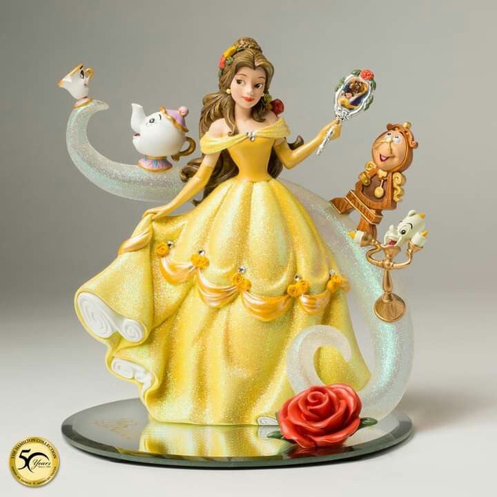 disney figurine with beauty and the beast characters