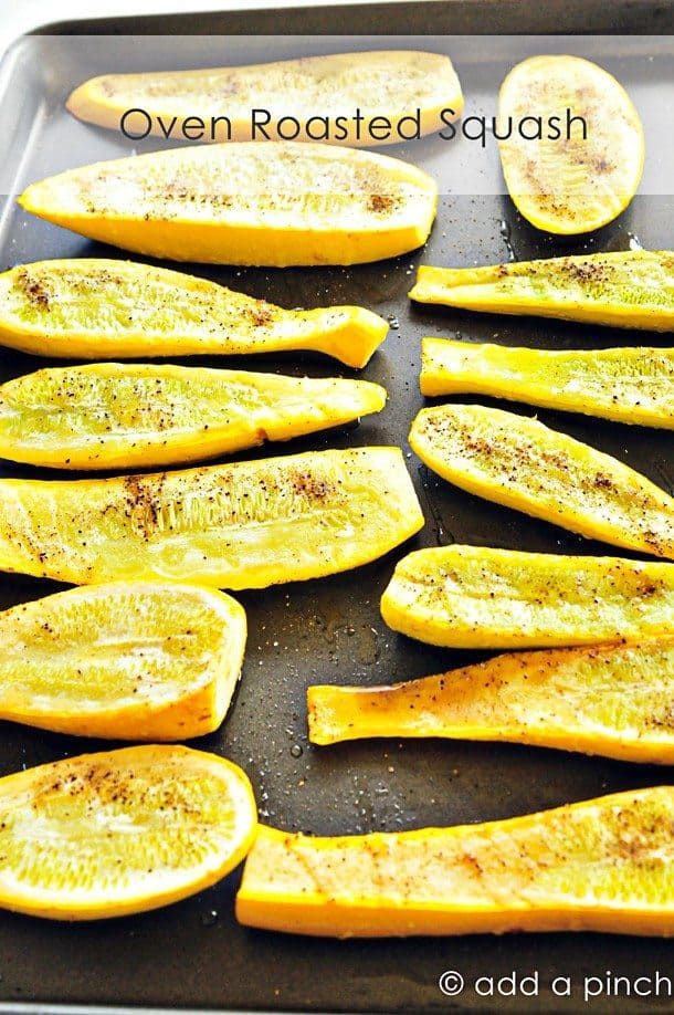 oven roasted squash on a baking sheet ready to be cooked in the oven for dinner