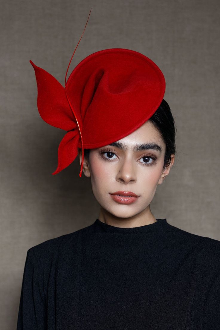 Melissa is an elegant free-formed percher style cocktail hat that is made from velour felt and finished with bow detail and curled feather quill. This cocktail hat would be the ideal choice whether you are attending a wedding, cocktail soiree or other special occasion and can be made in most colours to compliment your outfit. Each hat is made exclusively by hand. This hat is from the Trajectoria Collection, a millinery collection inspired by Maggie's passion for beekeeping.  The details incorporated in many of the hats echo both natural forms and the shapes of the honeybee flight paths and the movement of the bees, in a purely abstract sense.  The name Melissa means honey. * Best quality velour felt. * The hat secures with a metal comb and millinery headband (can be dyed to your hair colou Felt Leaf, Fascinator Hats Diy, Leaf Headpiece, Feather Quill, Occasion Hats, Mini Hat, Ascot Hats, Felt Leaves, Cocktail Hat